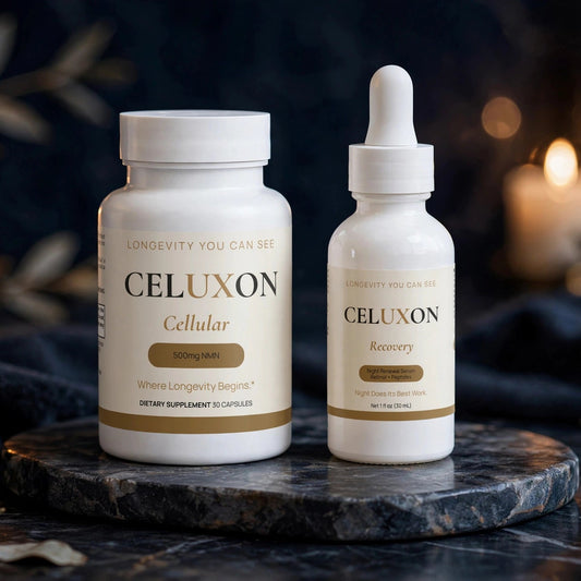 Two white CELUXON supplement containers on a dark marble tray: a rounded bottle labeled Cellular and a dropper bottle labeled Rosemary, styled with lit candles and leaves in a dark setting.